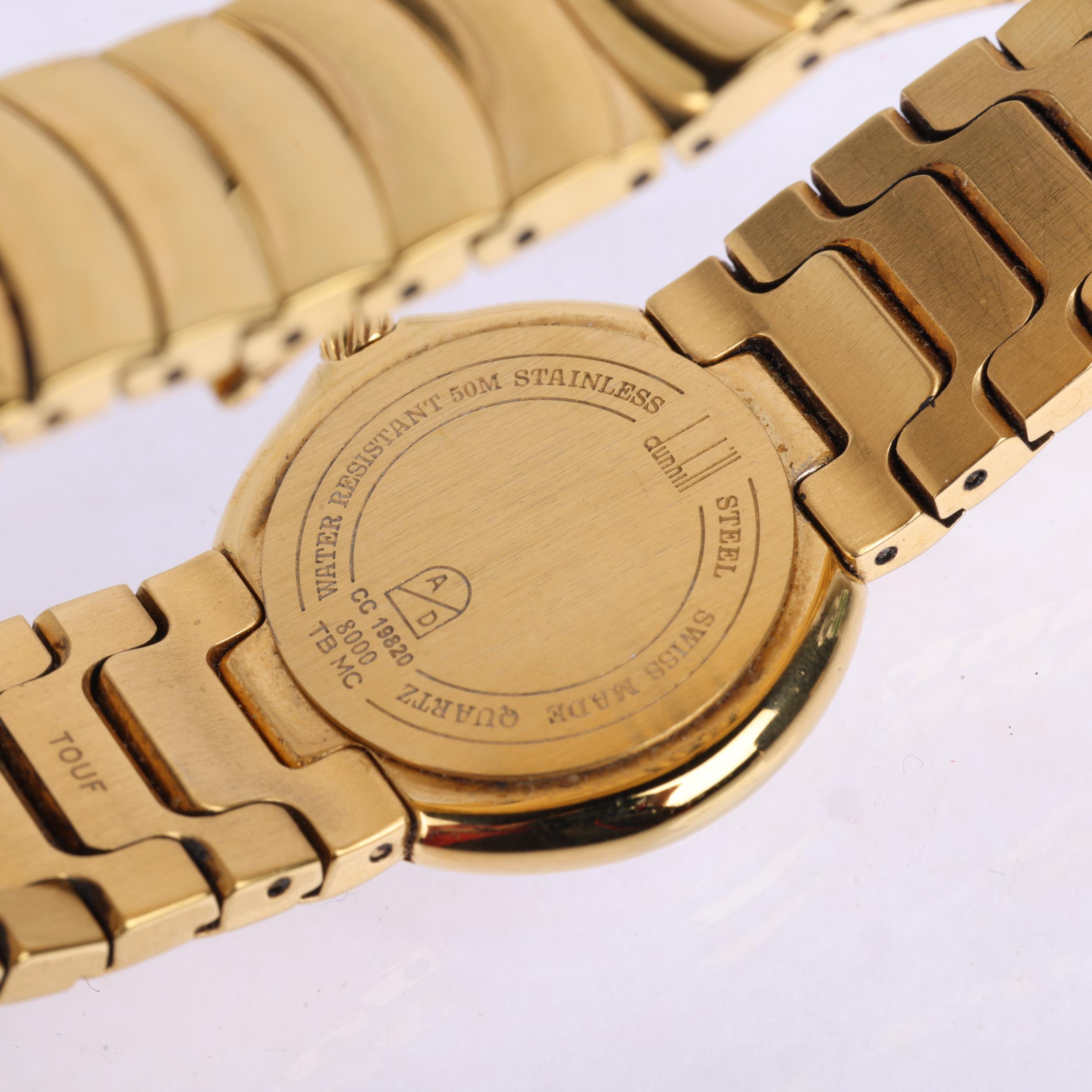 DUNHILL - a lady's gold plated stainless steel Millennium quartz bracelet watch, ref. 8000, white - Image 4 of 5