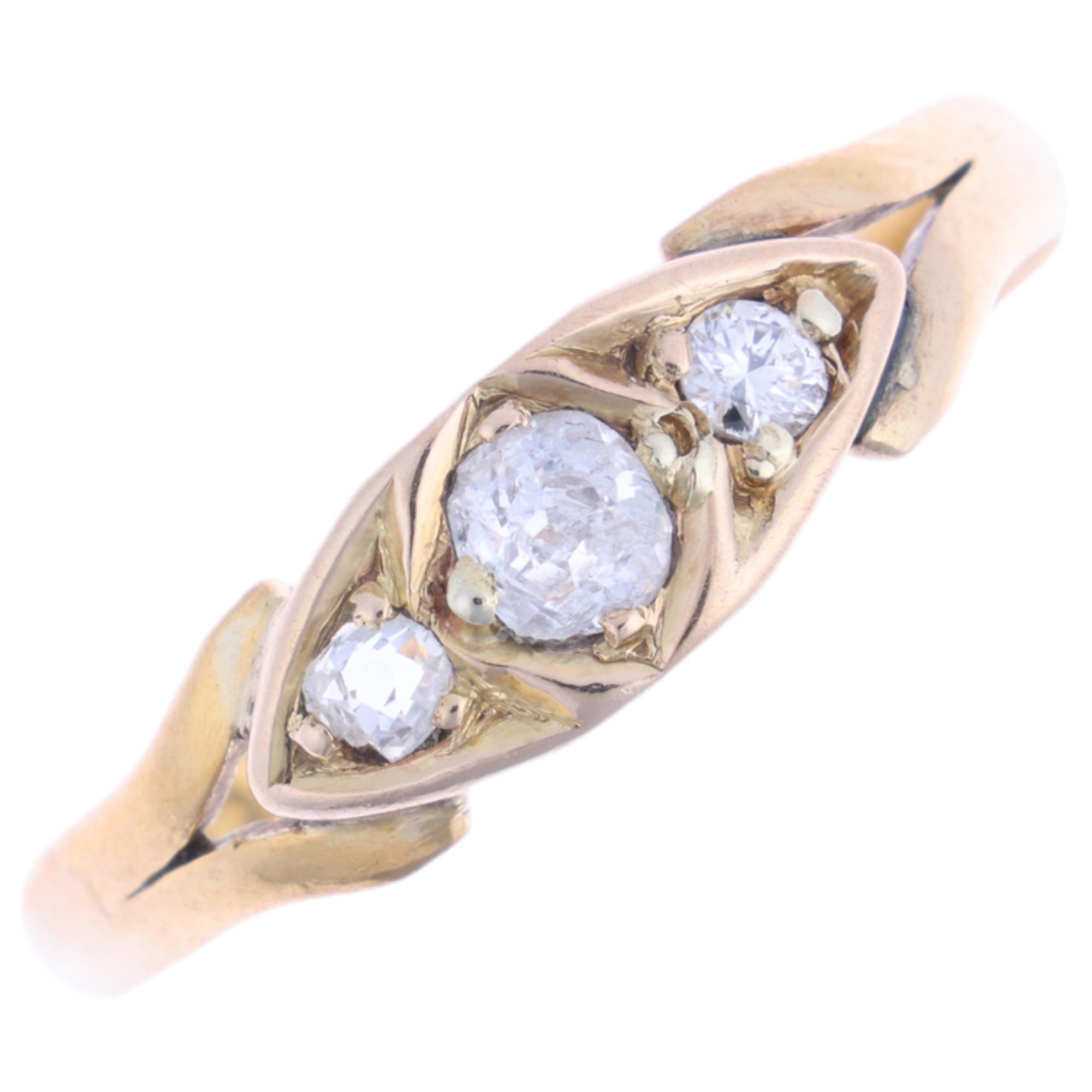 A 19th century 22ct gold three stone diamond ring, indistinct maker, Birmingham 1876, set with old-