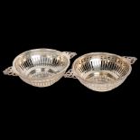 A pair of George VI silver 2-handled bon bon baskets, Barker Brothers Silver Ltd, Birmingham 1937,