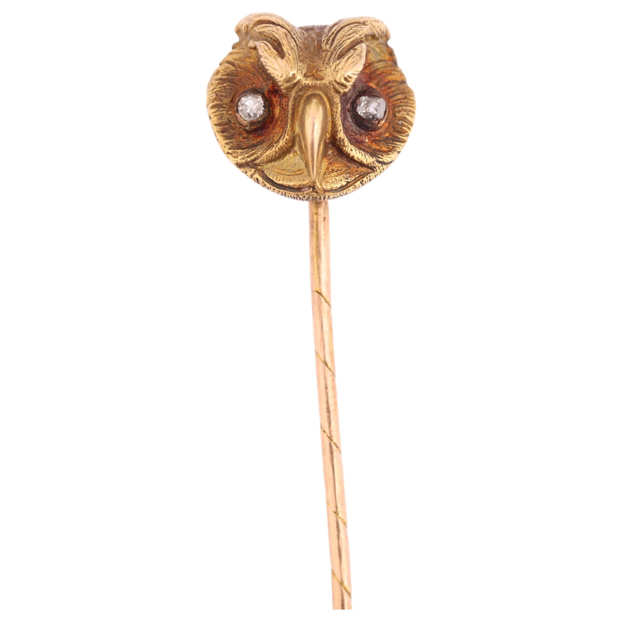 ATTRIBUTED TO PAUL ROBIN - a French 18ct gold diamond owl mask stickpin, circa 1880, modelled as