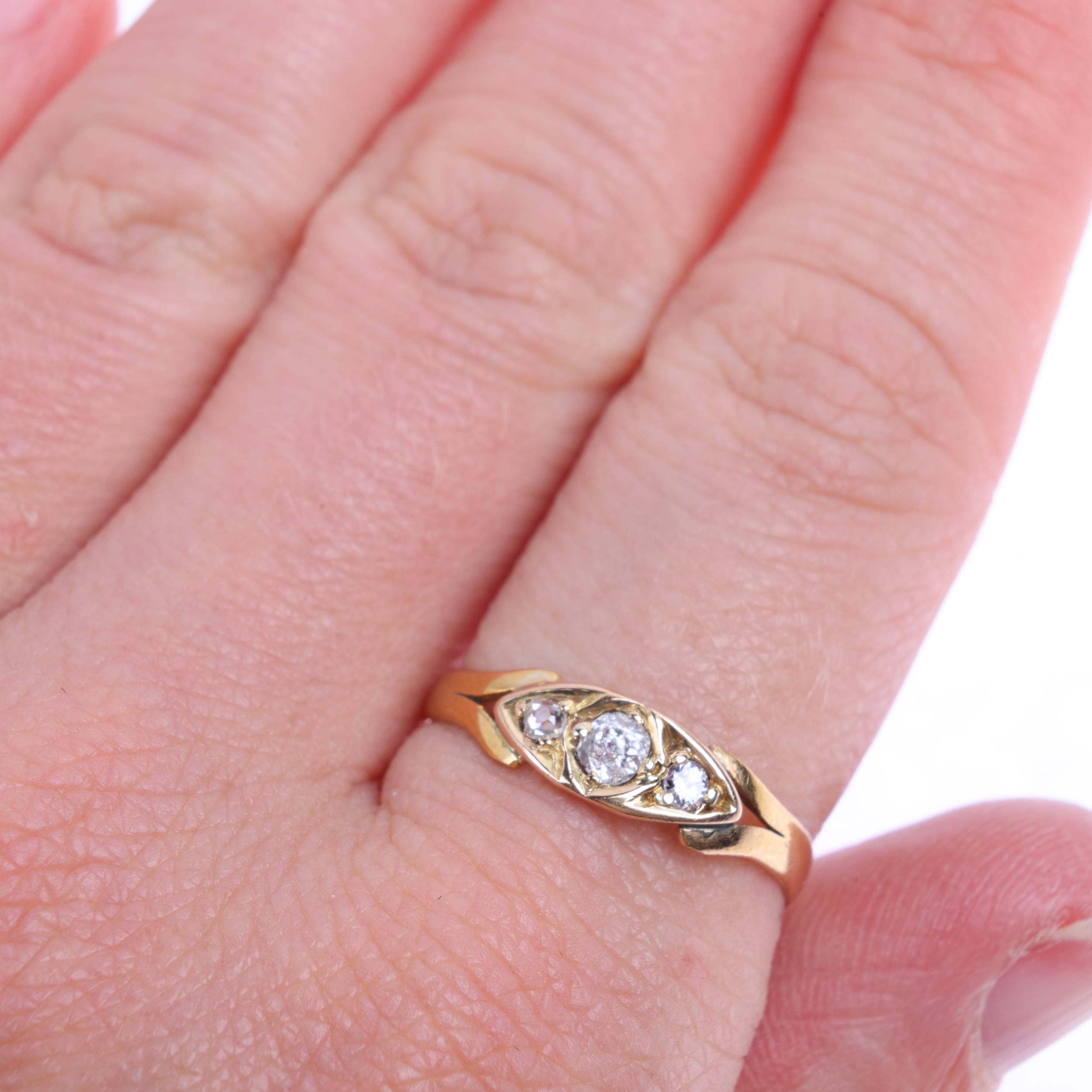 A 19th century 22ct gold three stone diamond ring, indistinct maker, Birmingham 1876, set with old- - Image 4 of 4