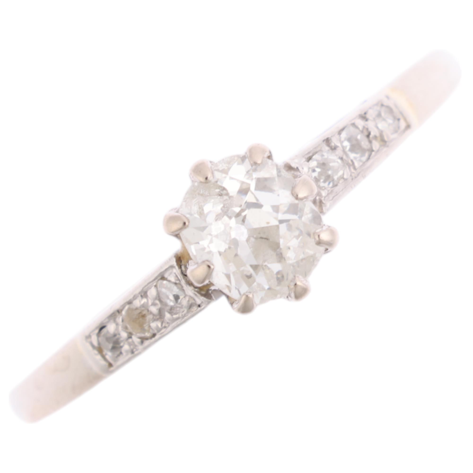 An Art Deco platinum 0.35ct solitaire diamond ring, claw set with old-cut diamond and diamond