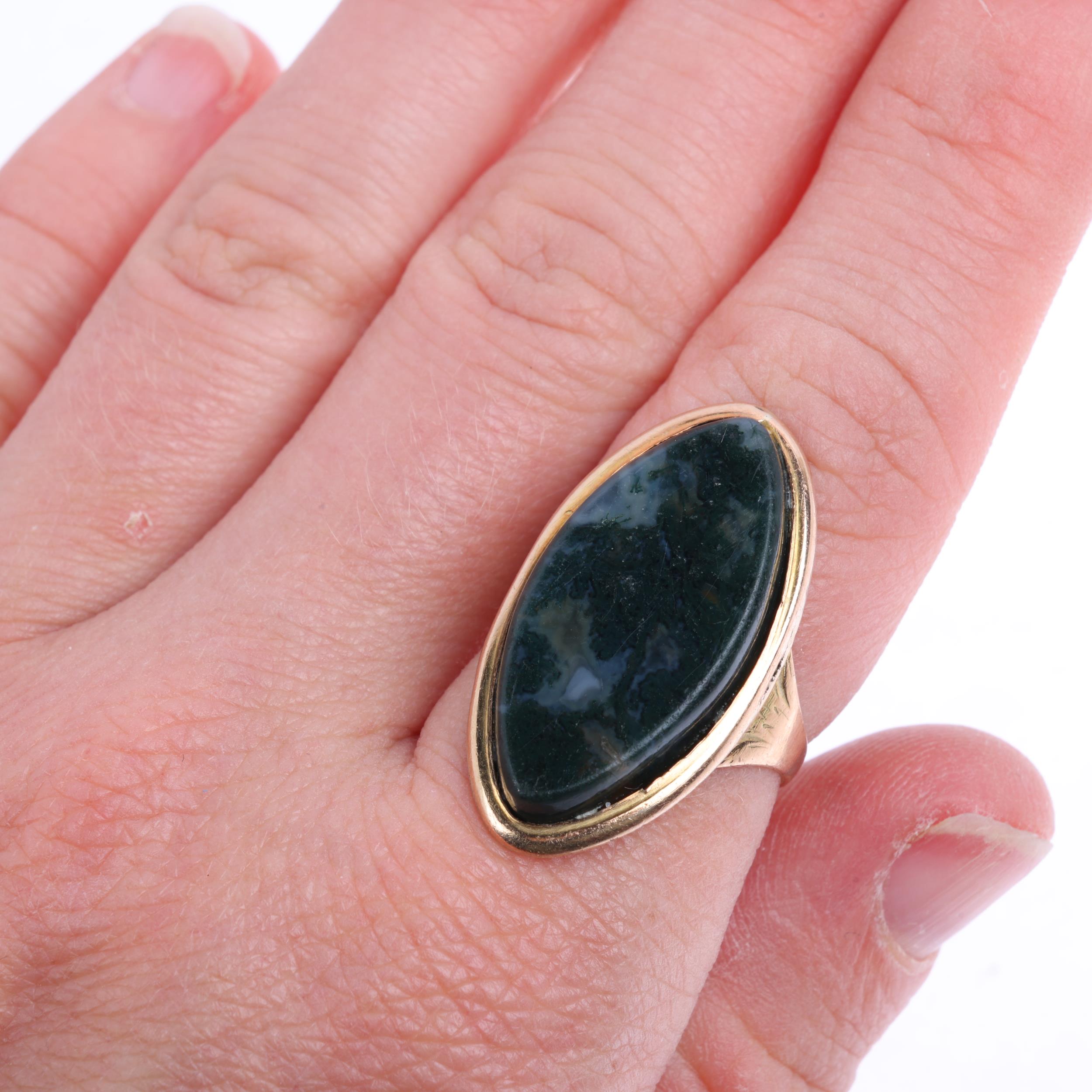 A Georgian moss agate marquise mourning ring, circa 1780, rub-over set with flat-top marquise-cut - Image 4 of 4