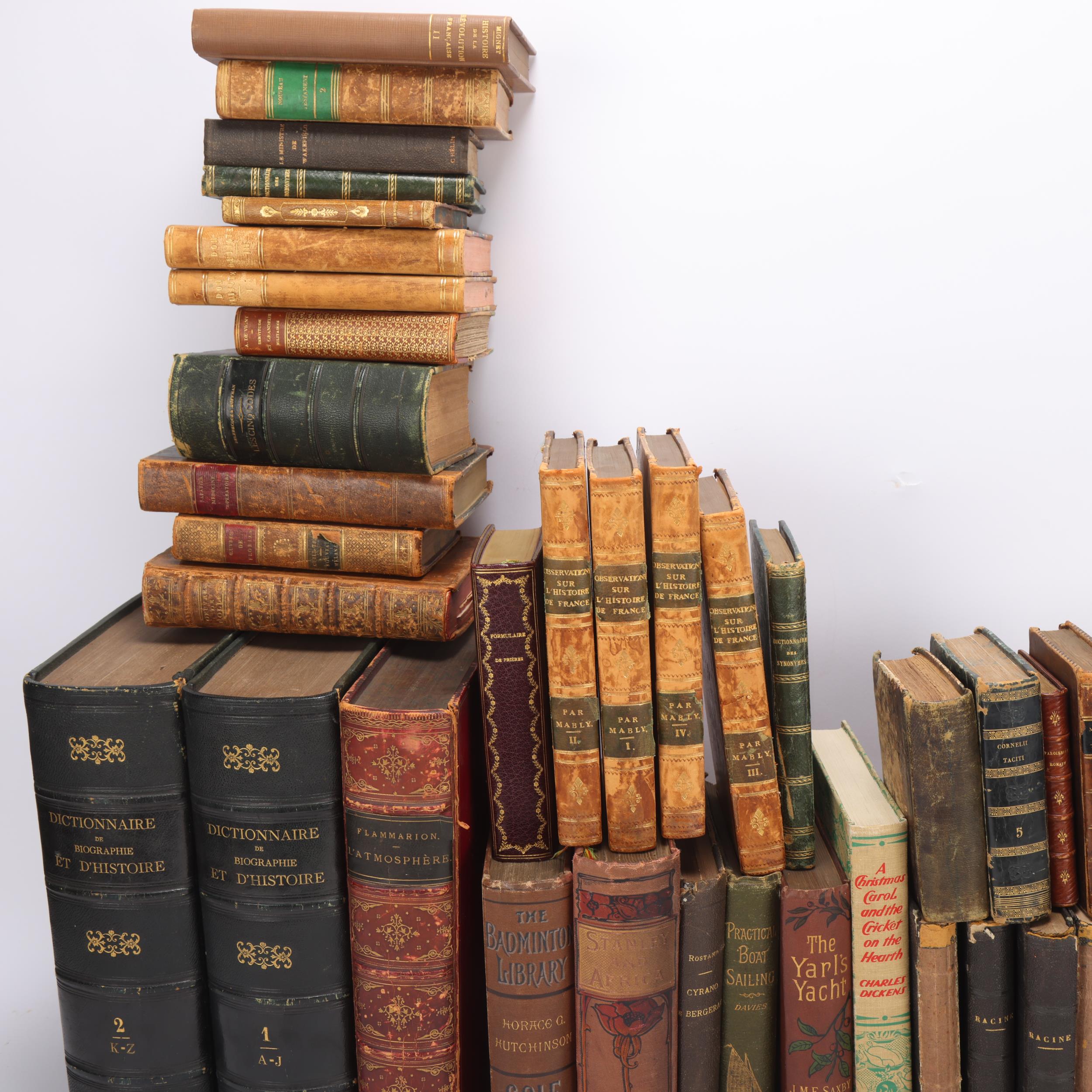A quantity of Antique leather-bound books, many with gilded and ...