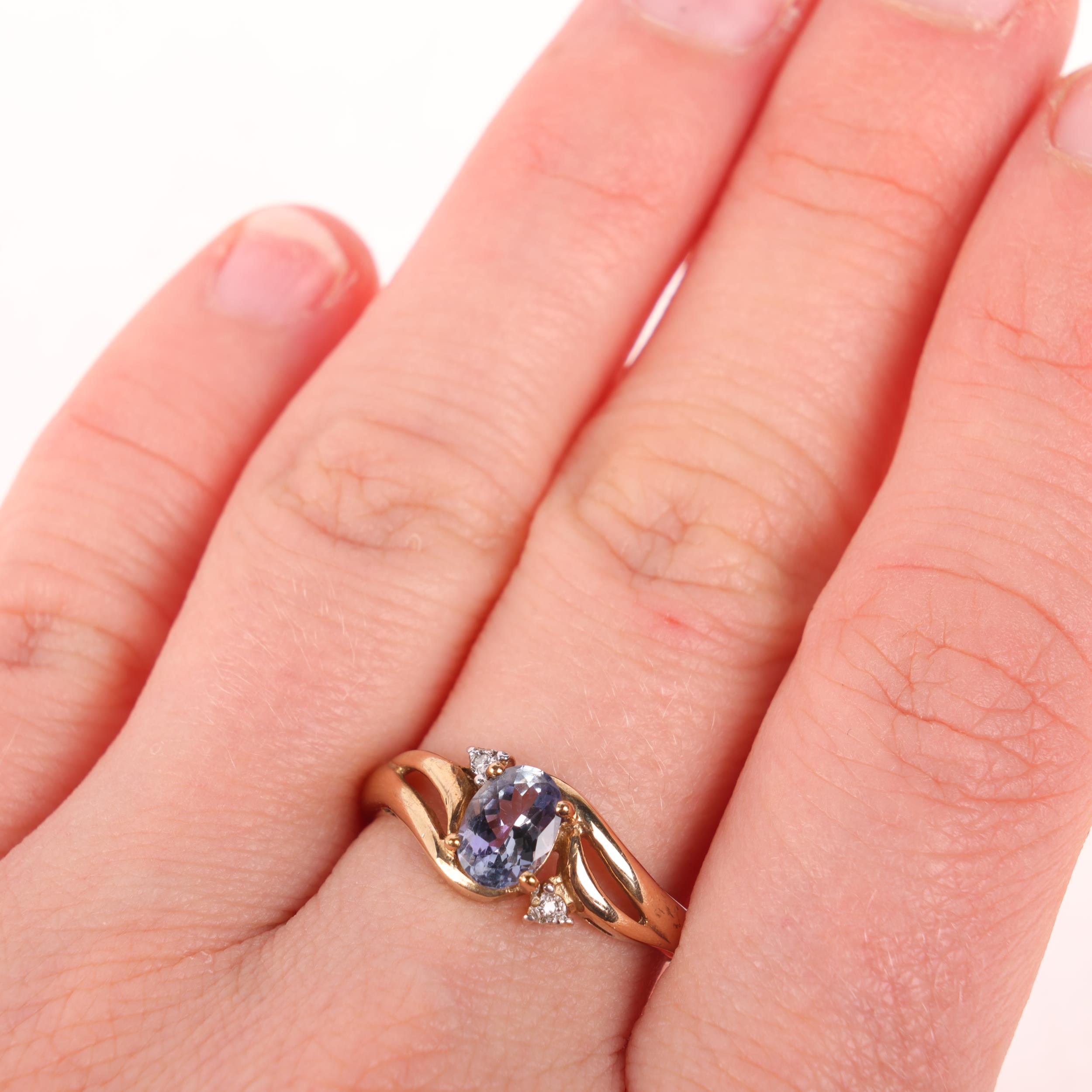 A 9ct gold tanzanite and diamond dress ring, set with oval mixed-cut tanzanite and single-cut - Image 3 of 3