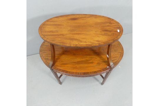 A Early 20th century mahogany 2-tier oval side table. Width 84cm, height 78cm, depth 57cm. - Image 2 of 2