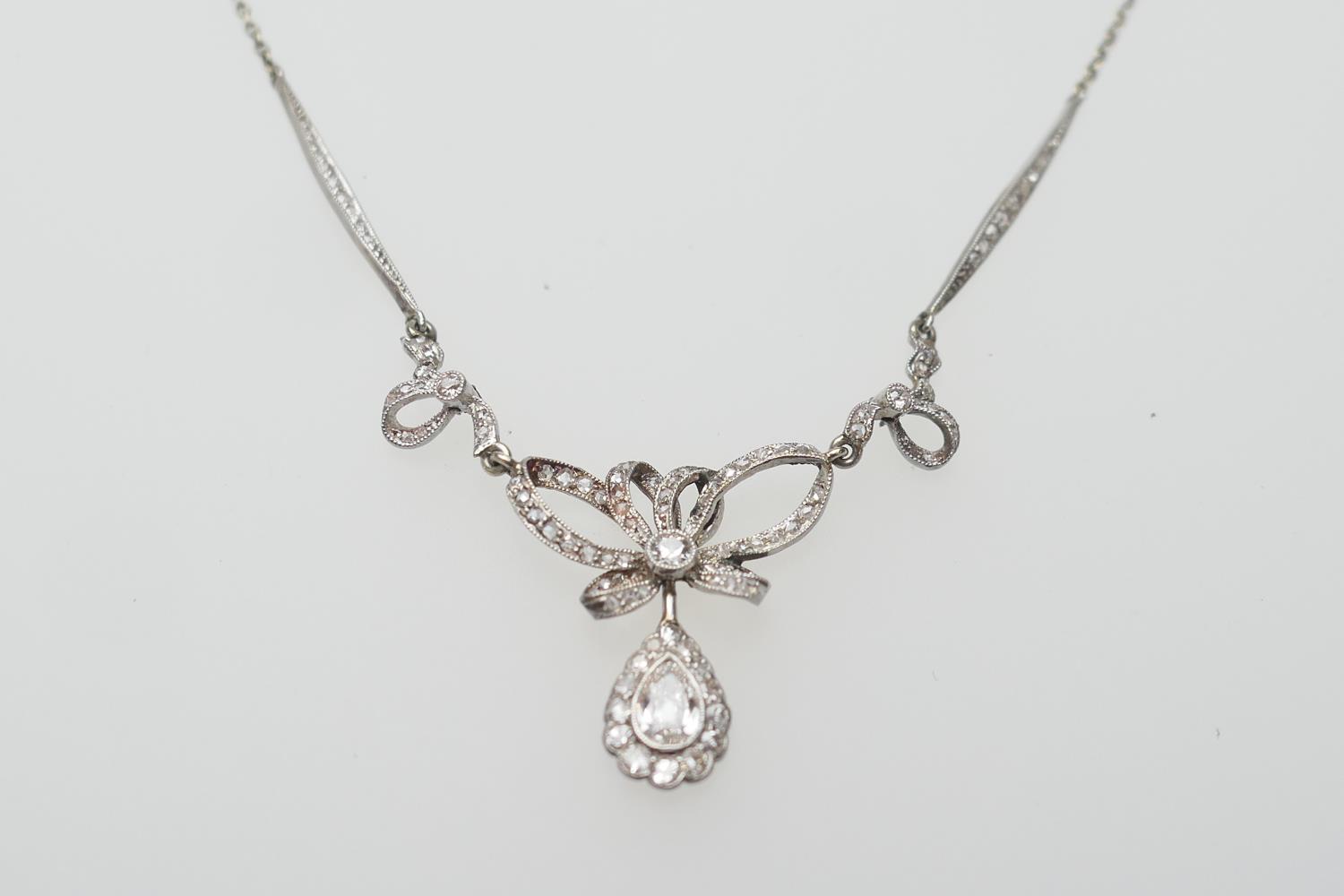 Diamond pendant necklace, centred with a pear cut diamond of approx. 0.5ct, colour estimated as G/H,