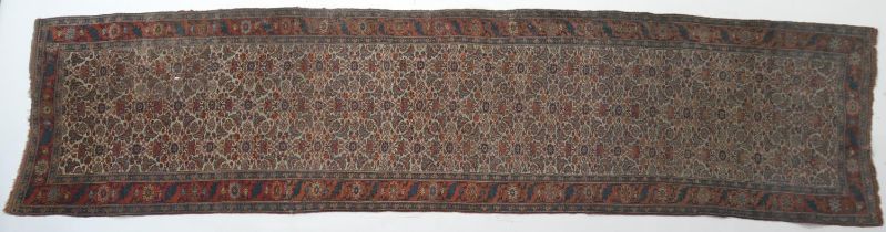 Bidjar woollen runner, circa 1900, fawn field with a herati of flowerheads and crescent form foliage