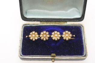 Edwardian 15ct gold pearl flowerhead bar brooch, 52mm, gross weight approx. 6.5g (Please note