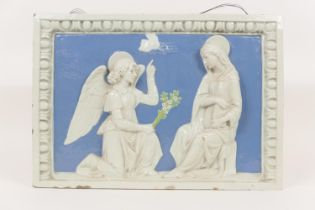 Cantigalli glazed terracotta panel, worked in bas relief with a depiction of The Annunciation