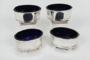 Two pairs of Irish silver table salts, maker R W, Dublin 1947/1950, of good gauge, oval form