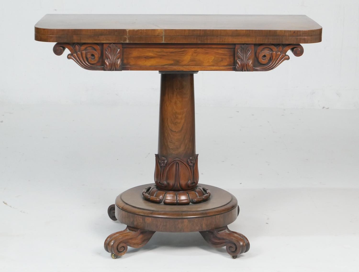 William IV rosewood folding pedestal card table, circa 1835, the top swivelling over an acanthus