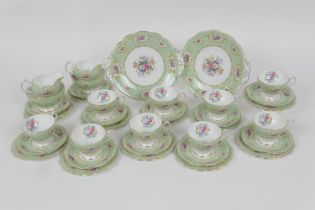 Queen Anne Gainsborough pattern china tea set, comprising nine cups, twelve saucers, twelve side