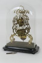 Late Victorian brass skeleton timepiece clock, 11cm silvered chapter dial with Roman numerals,