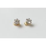 Pair of diamond stud earrings, round brilliant cut stones, each of approx. 0.75ct, well matched in