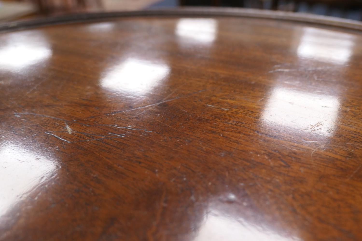 George III mahogany dumb waiter, pedestal form with two circular moulded edge shelves, on a turned - Image 7 of 7