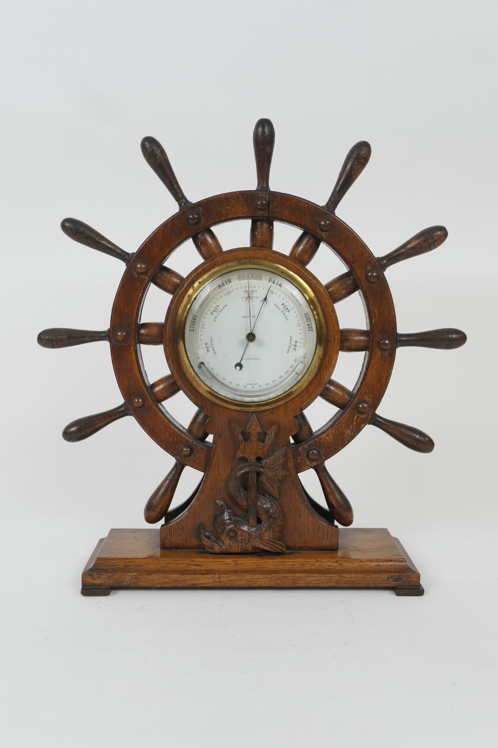 Nautical themed oak cased barometer, the dial signed 'M Ayler, Llandudno', 11cm dial set with