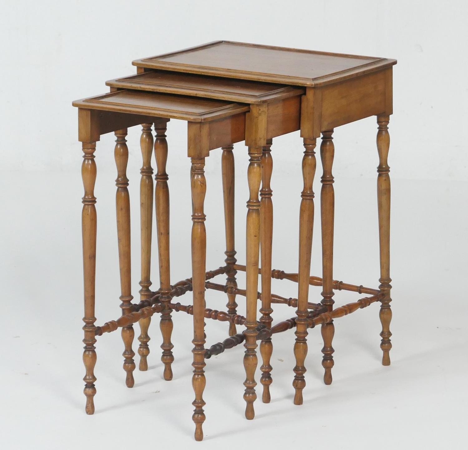 Nest of American walnut occasional tables, late 19th Century, the largest 44cm x 32.5cm, all