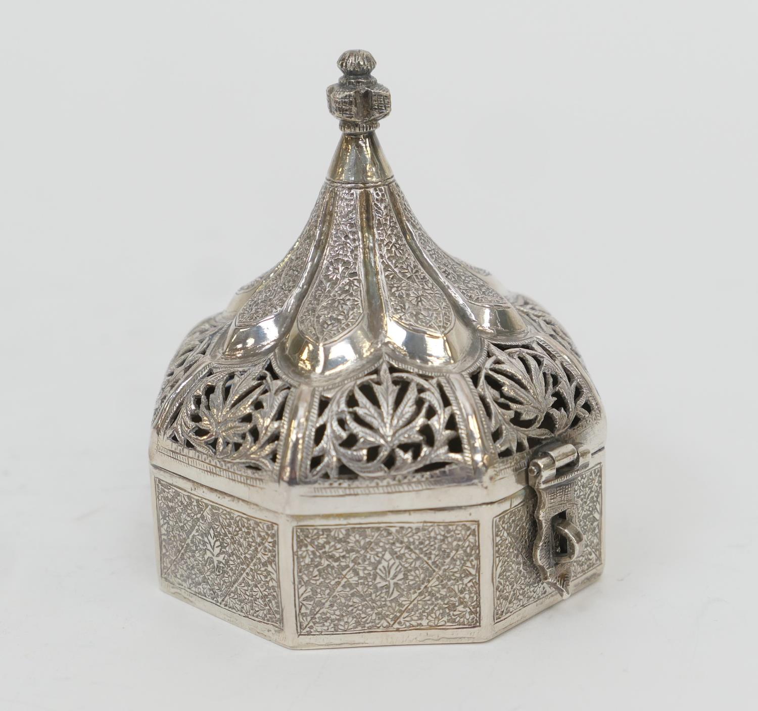 Eastern white metal box, India or Ceylon, circa 1900, octagonal form, hinged cover pierced with