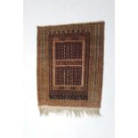 Bokhara woollen rug, faded madder ground and multi guard stripe border, size approx. 125cm x 96cm (