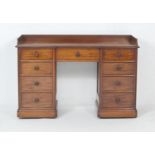 Victorian mahogany kneehole washstand, circa 1860, three-quarter gallery, fitted with a