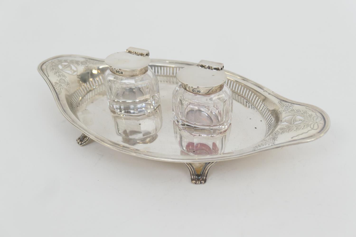 Edwardian silver inkstand, by Hawksworth Eyre Ltd, Sheffield 1903, oval stand, pierced and