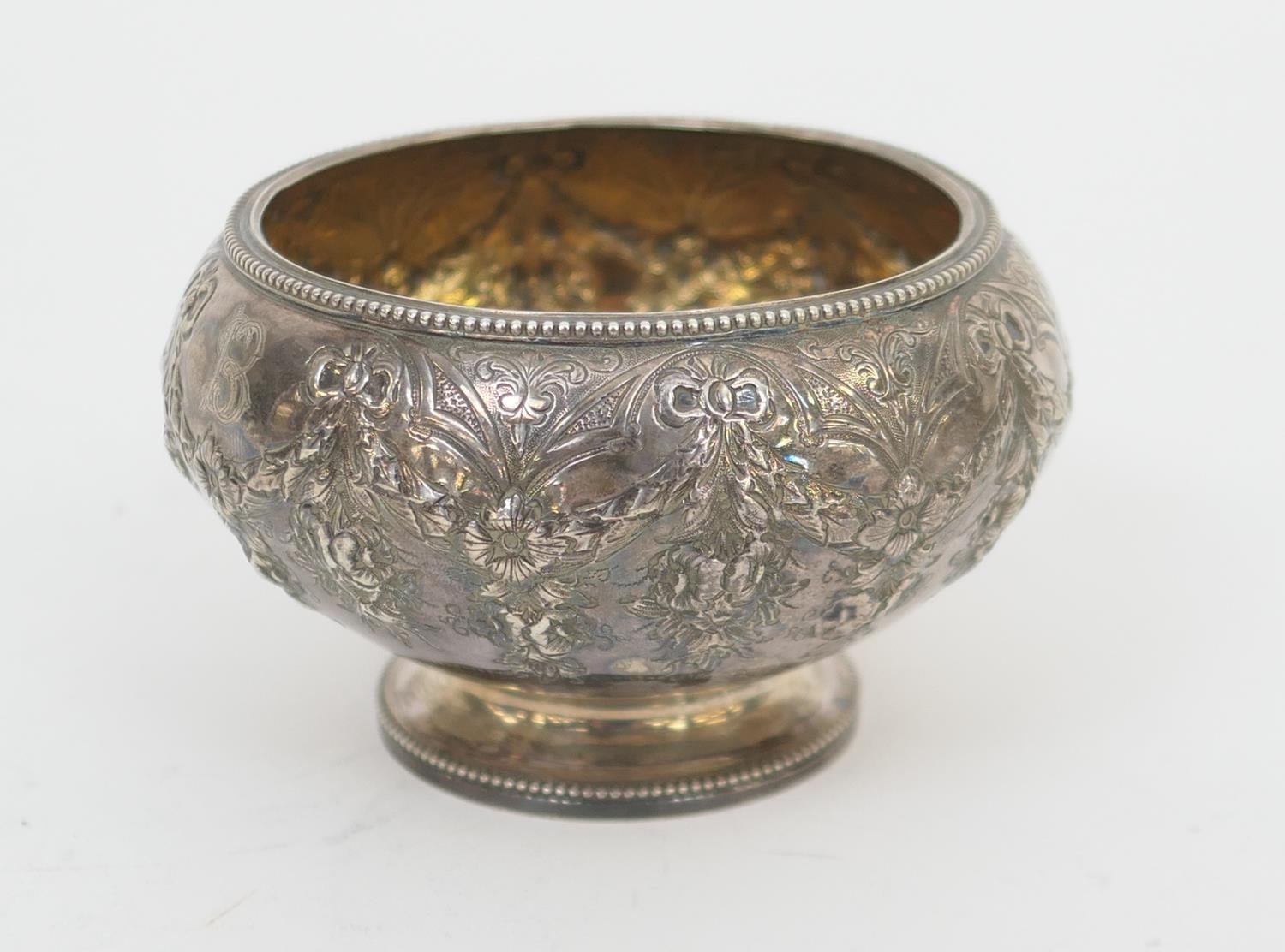 Victorian silver sugar bowl, Sheffield 1869, with foliate garland decoration, gilt interior, over