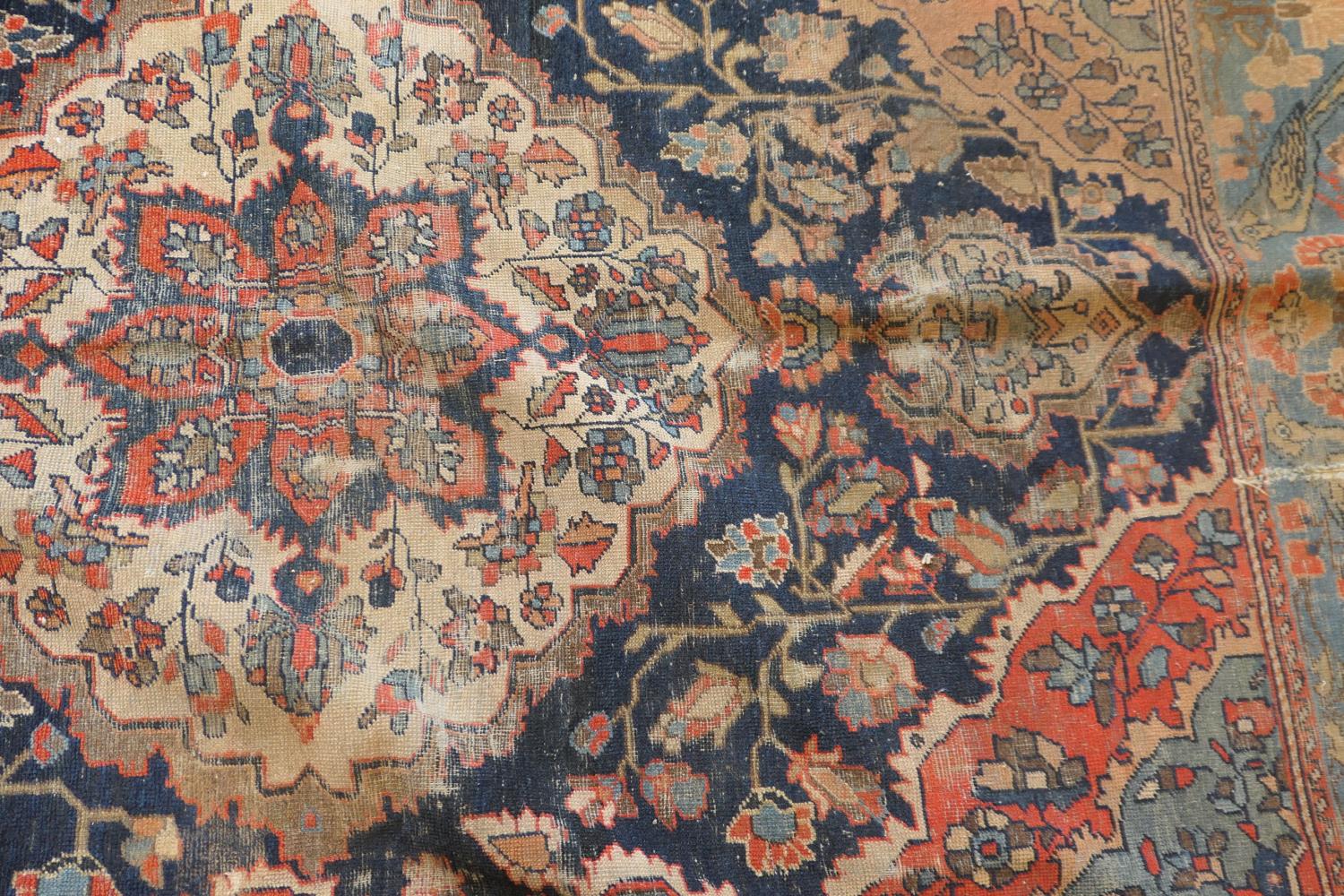 Persian Malayer woollen rug, late 19th Century, centred with a red flowerhead motif within a fawn - Image 8 of 9