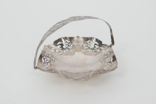 Elizabeth II silver bonbon basket, Birmingham 1973, pierced hexagonal form with swing handle, raised