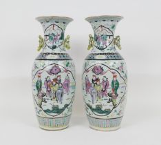 Pair of Chinese famille rose vases, probably Canton, 19th Century, decorated with panels of