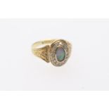 Edwardian opal and diamond memorial cluster ring in 15ct gold, the opal approx. 7mm x 4mm,