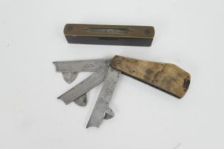 Victorian horn mounted steel phlegms; also a small brass mounted spirit level (2) (Please note