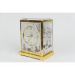 Jaeger Le-Coultre gilt brass chinoiserie Atmos clock, plexi-glass panels, signed Marina, 526-5