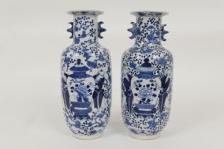 Matched pair of Chinese blue and white vases, late 19th Century, of rouleau form decorated with