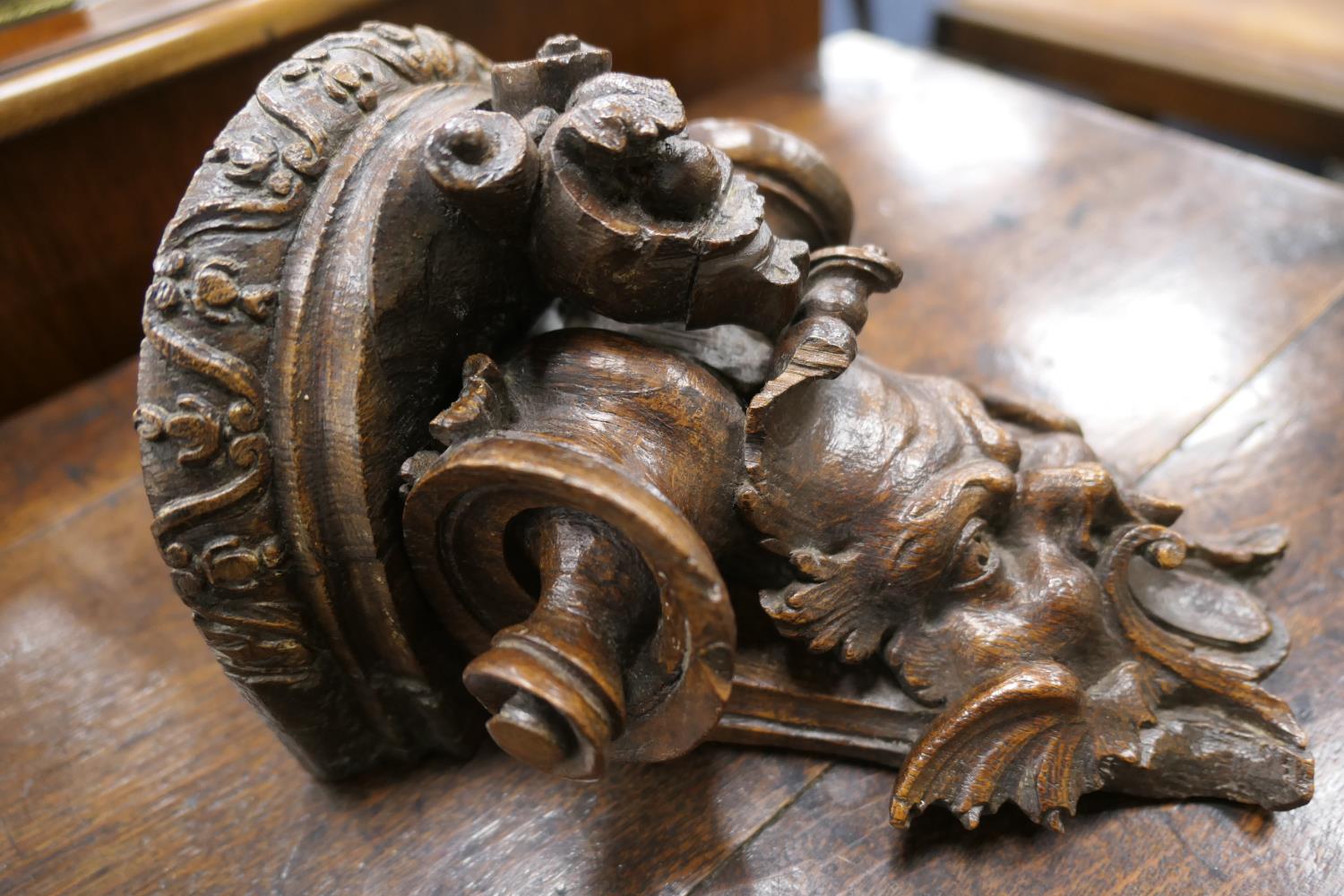 Late 17th Century carved oak bracket, carved with a grotesque mask and paper scroll, 22cm x 16. - Image 4 of 7