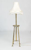Edwardian brass extending standard lamp, centred with a galleried circular tray detailed with