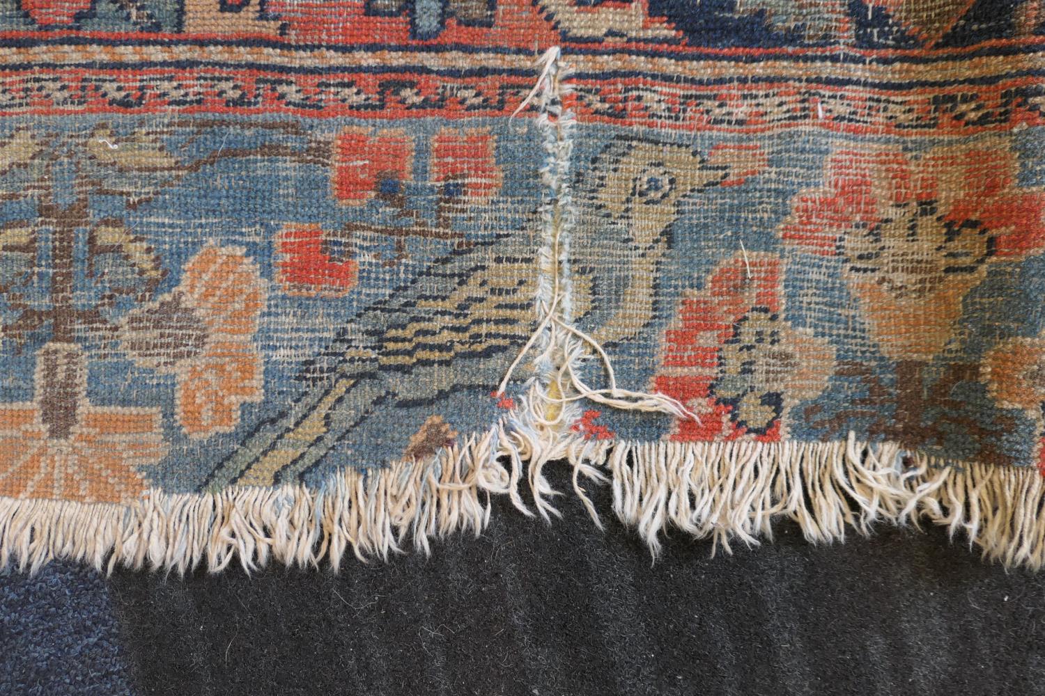 Persian Malayer woollen rug, late 19th Century, centred with a red flowerhead motif within a fawn - Image 4 of 9