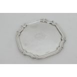 Elizabeth II silver presentation salver, Birmingham 1950, shaped square form centred with a