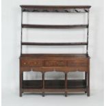 Early George III oak dresser and plate rack, North Wales, circa 1760, open rack with a shaped