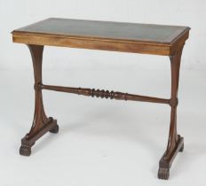William IV mahogany lady's writing table, with gilt tooled green leather top over lappet carved