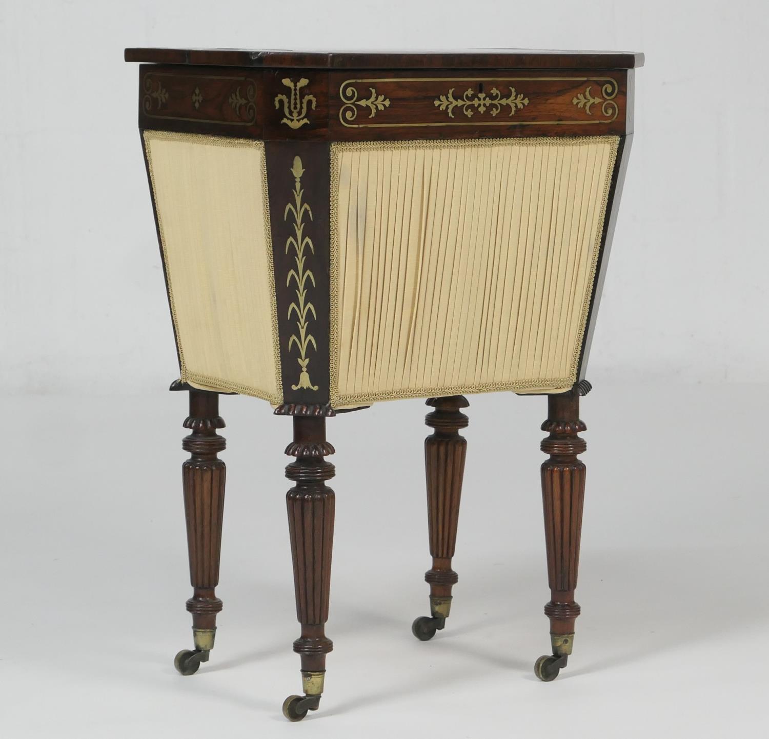 George IV rosewood and brass inlaid decanter stand or sewing box, circa 1825, the top with canted