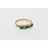 Cabochon jade and diamond ring, in 14ct yellow gold, three cabochon jades dispersed with four tiny