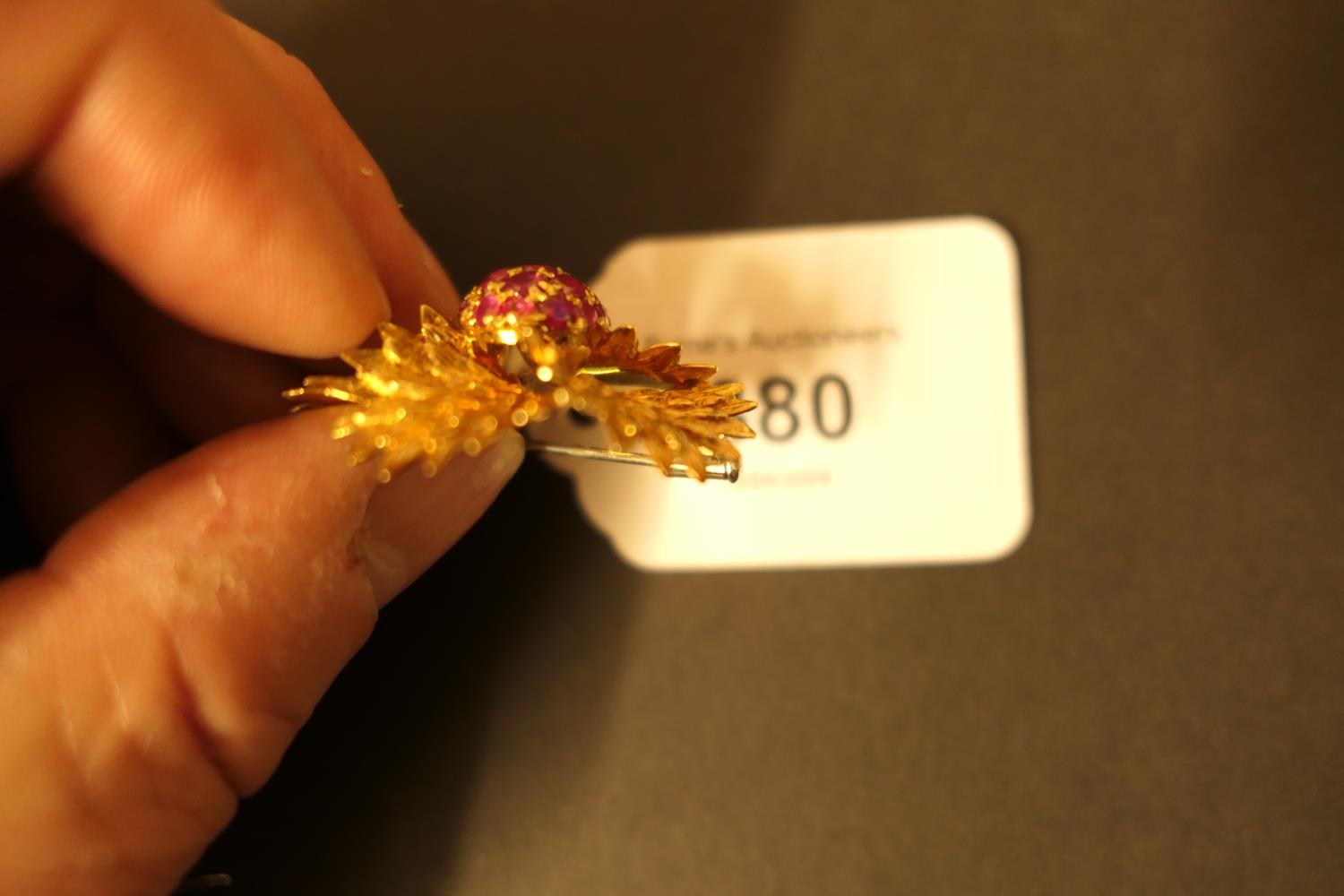 18ct gold and ruby chrysanthemum brooch, centred with a pistil of round cut rubies within a textured - Image 4 of 5