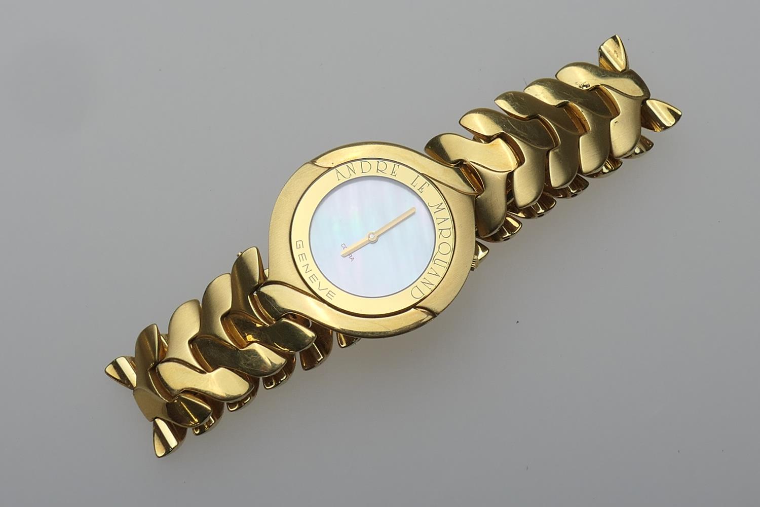 Andre Le Marquand, Geneve, an 18ct gold gent's quartz wristwatch, with numberless mother of pearl