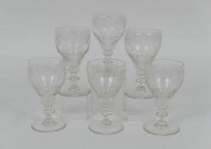 Set of six late Victorian wine glasses, each with ogee bowl engraved with fruiting vines and blade