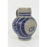 German Westerwald stoneware jug, baluster form moulded with GR cypher beneath a crown, bordered with