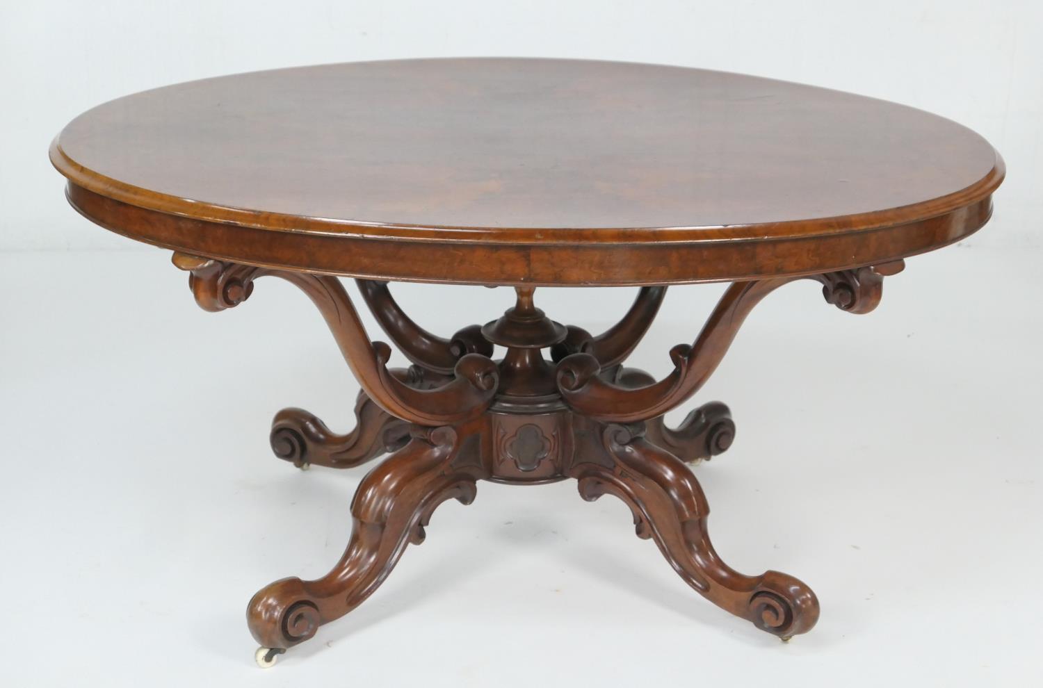 Victorian burr walnut breakfast or supper table, circa 1840-60, the finely figured quarter