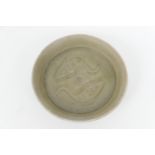 Chinese Longquan celadon dish, 12th or 13th Century, carved with twin fishes, 12.5cm diameter