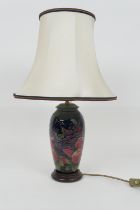 Moorcroft Finches and Berries ovoid table lamp, complete with original wooden base and cream