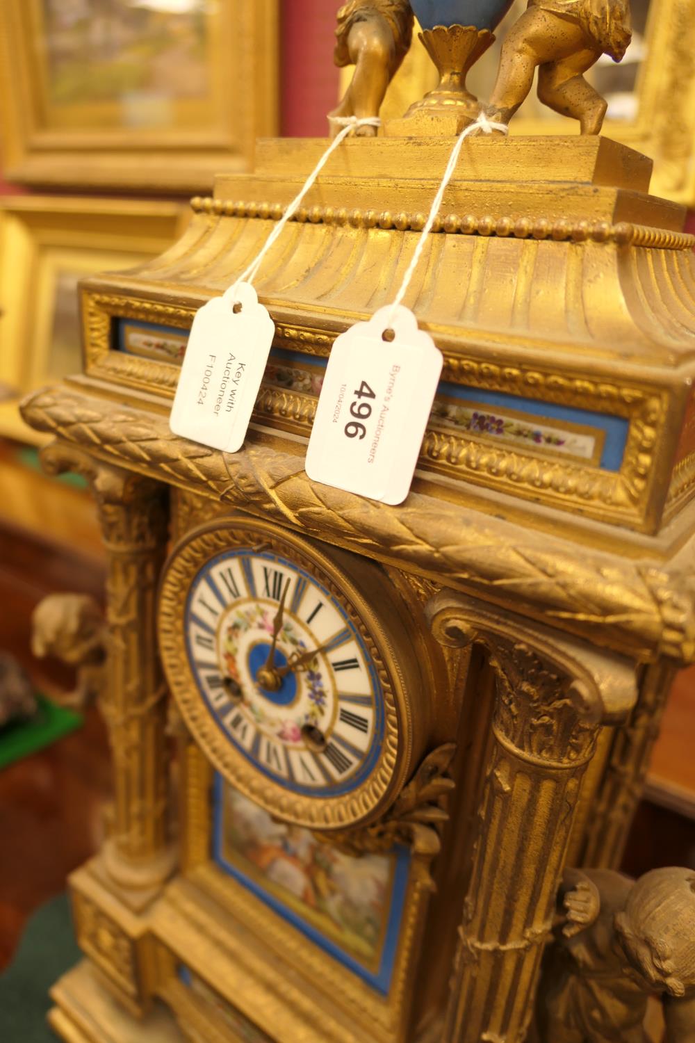 French gilt ormolu mantel clock, late 19th Century, surmounted with cherubs holding a flaming urn, - Image 2 of 4